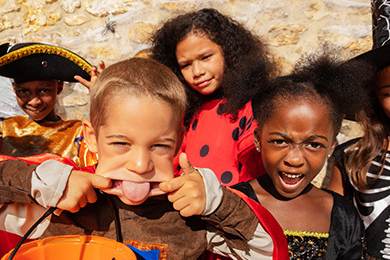 Kids dressed in Halloween costumes